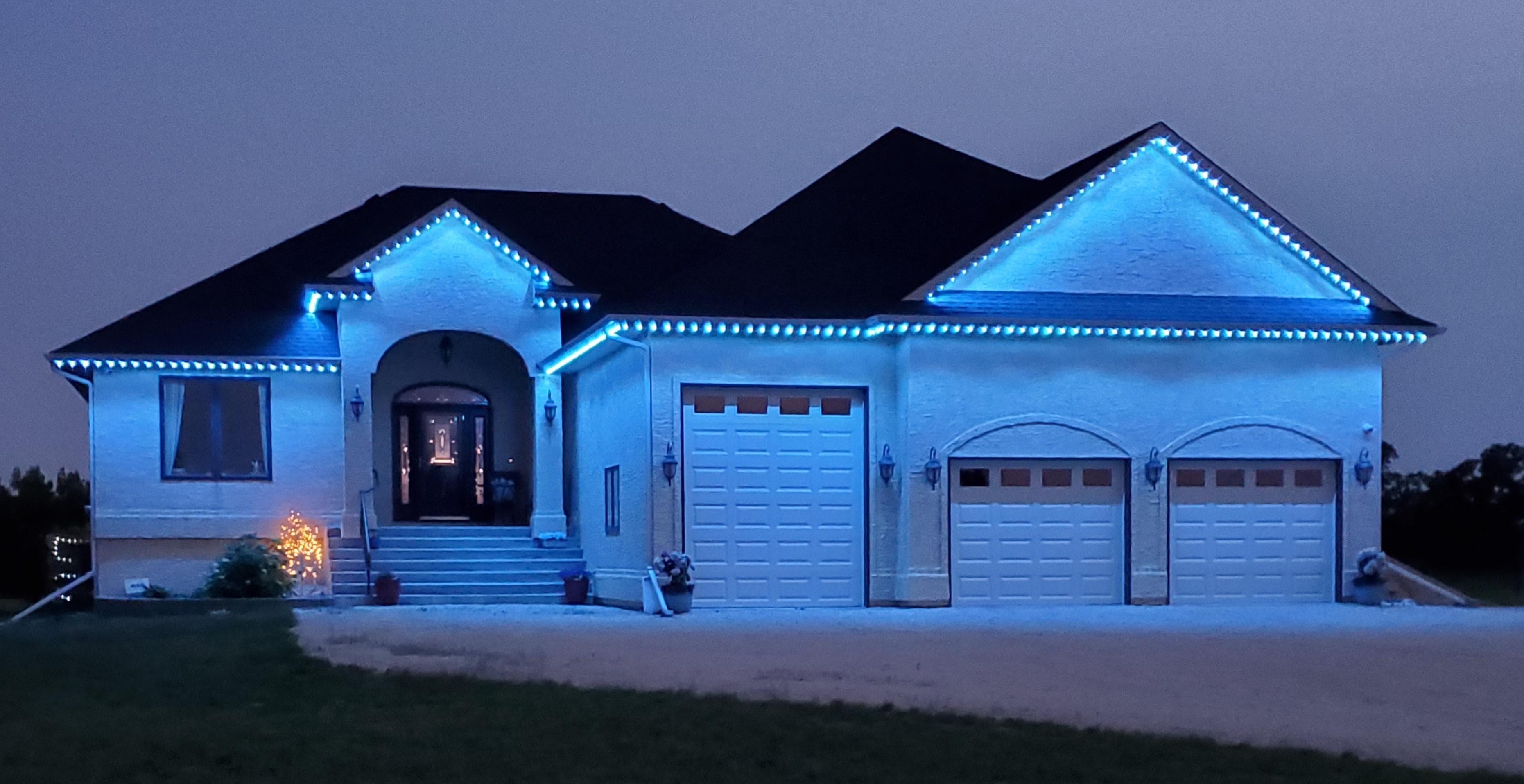 Permanent outdoor LED lighting installed on a Burlington home by Halton Glow Lighting at night